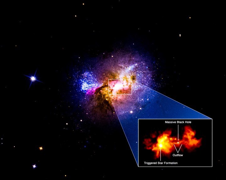 La galaxia enana con estallido estelar Henize 2-10 traza un flujo de salida.